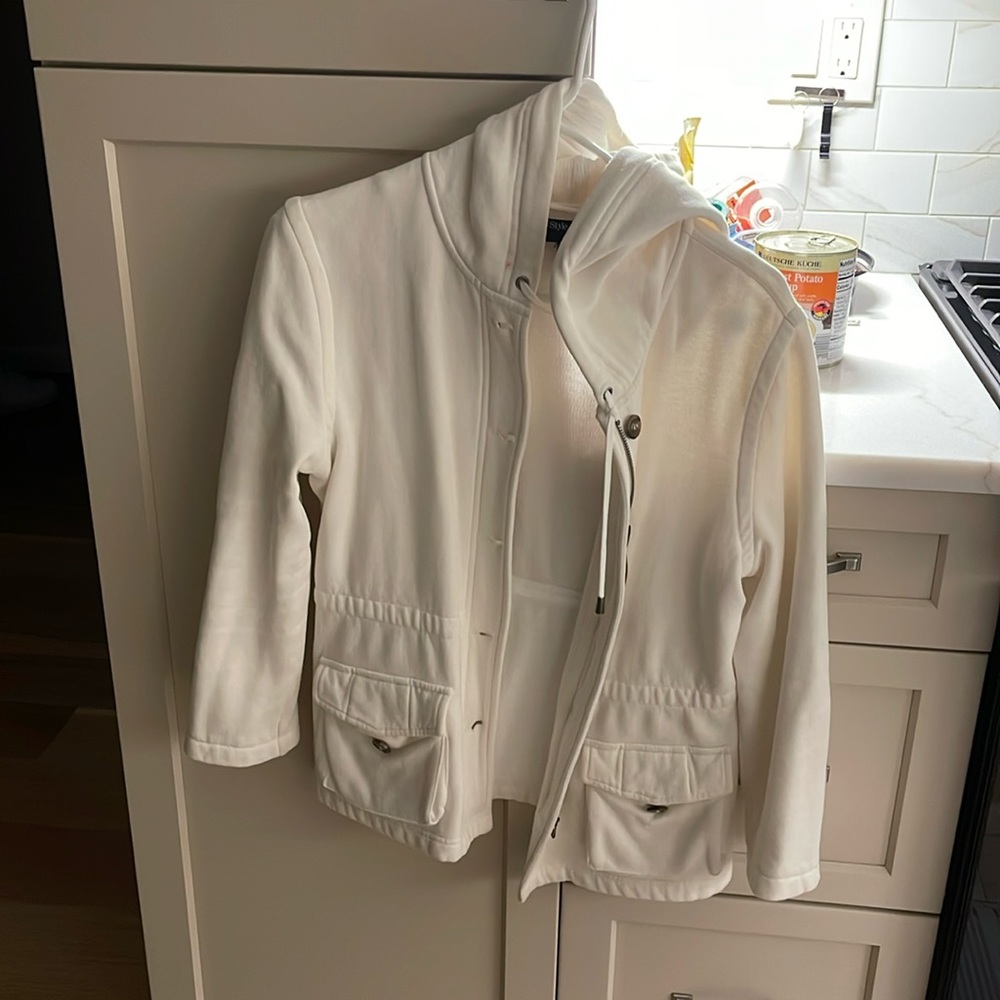 Women’s medium size hoodie with multiple pockets. Only one imperfection.